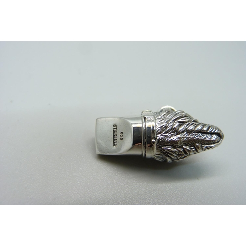 1102 - A silver dog whistle pendant