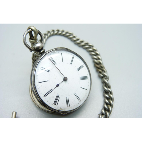 1120B - A silver pocket watch and an Albert chain