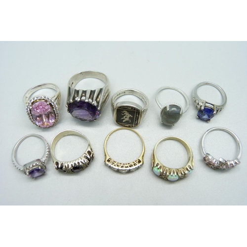 1132 - Ten silver and stone set rings, 77g