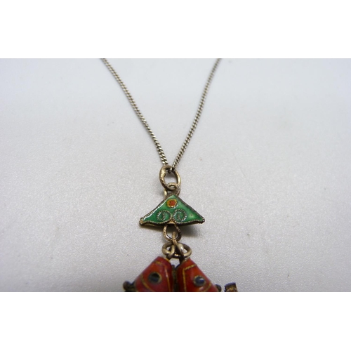 1161 - A vintage enamelled double fish pendant