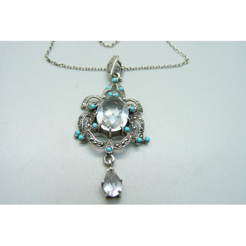 1162 - An Art Nouveau style pendant, set with turquoise, marcasite and paste on a silver chain