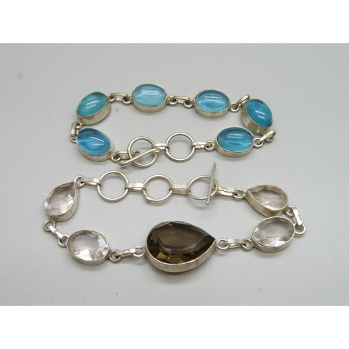 1166 - A silver and stone set bracelet, 18g, and a blue stone set bracelet