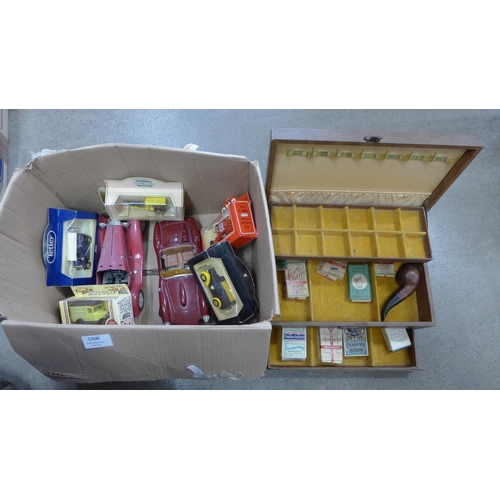 1200 - A box of model vehicles and a jewellery box with old cigarette packets and a pipe **PLEASE NOTE THIS... 