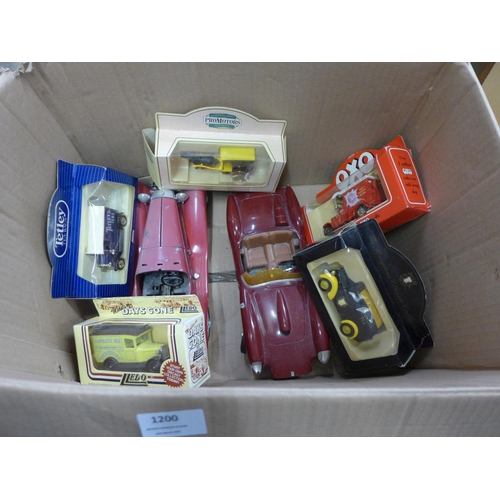 1200 - A box of model vehicles and a jewellery box with old cigarette packets and a pipe **PLEASE NOTE THIS... 