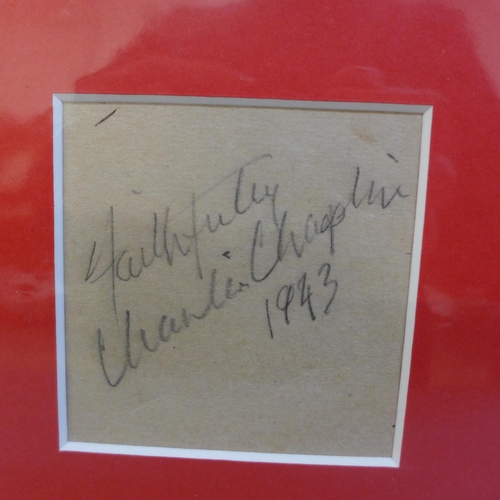 612 - A Charlie Chaplin autographed display, dated 1943