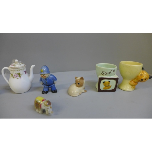 622 - Two 'Sooty' egg cups, miniature Royal Doulton tankards, etc.