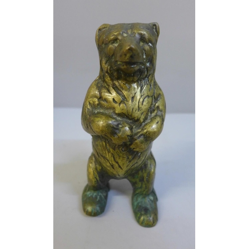 625 - A brass grizzly bear money bank, 14.5cm