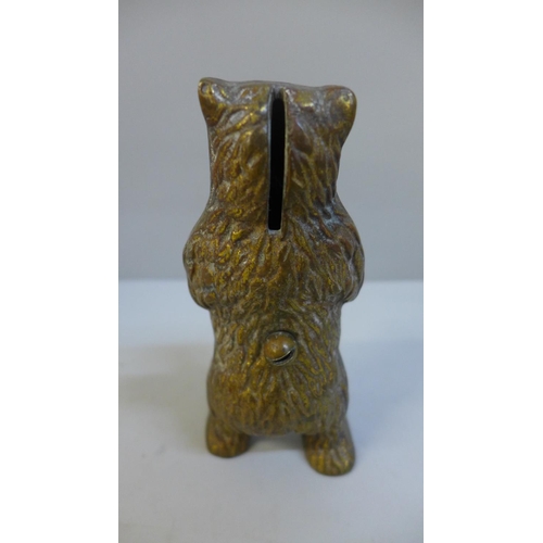 659 - A gilt brass grizzly bear money bank, 15cm