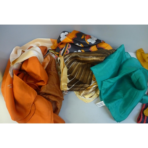 661 - A collection of twelve silk, cotton and polyester scarves including Christian Dior