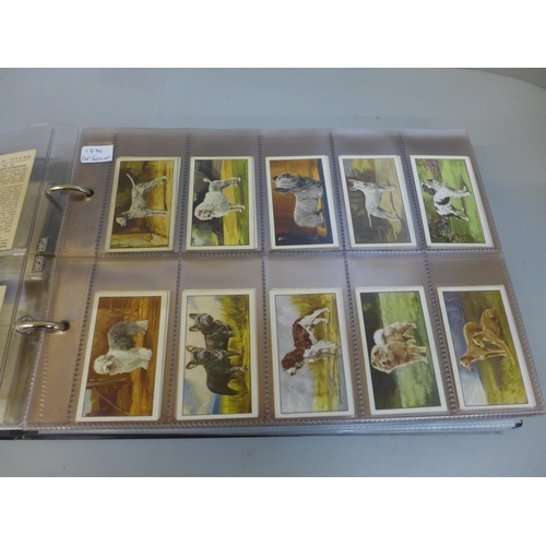 673 - Cigarette cards:- album containing thirteen complete sets, Gallaher, John Player, etc.