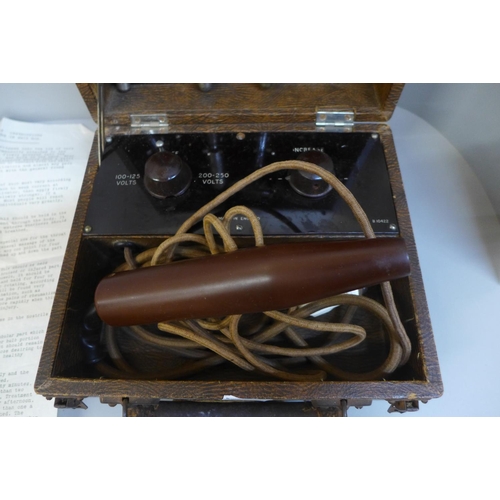 675 - A cased electricity massager device