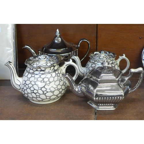 688 - Four silvertone teapots, including Royal Winton