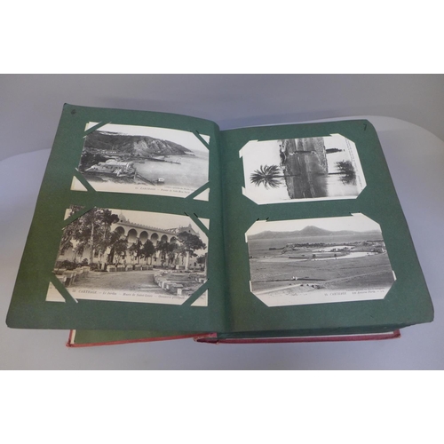 705 - A postcard album with over 350 early 20th Century cards of North Africa