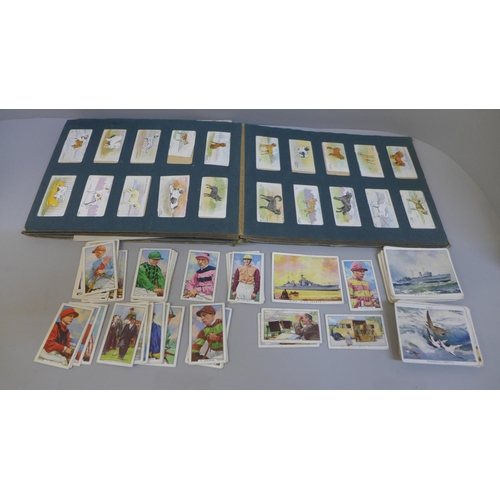 712 - An album of cigarette cards and a bag of loose cards