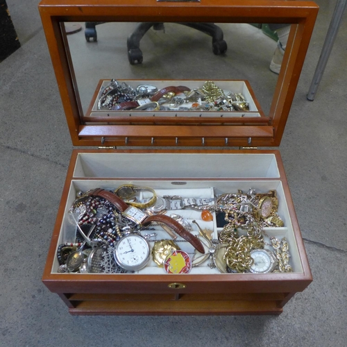 753 - A jewellery box and costume jewellery with wristwatches