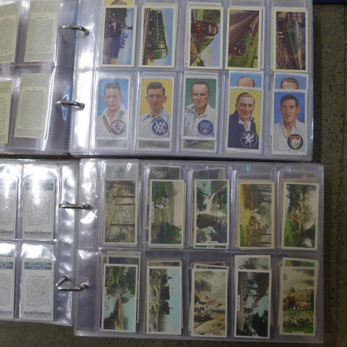 768 - Three albums of cigarette cards