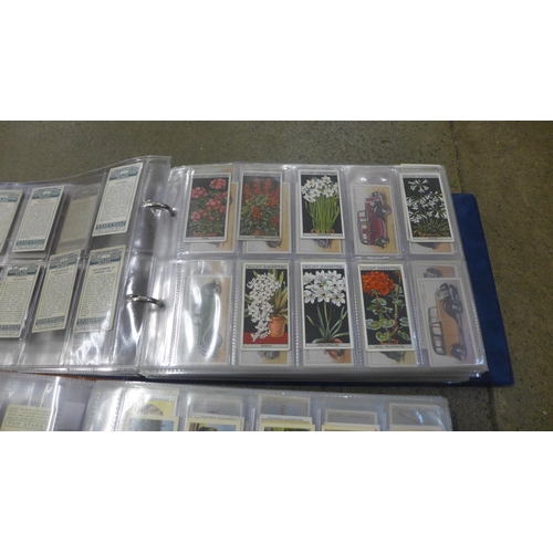 768 - Three albums of cigarette cards