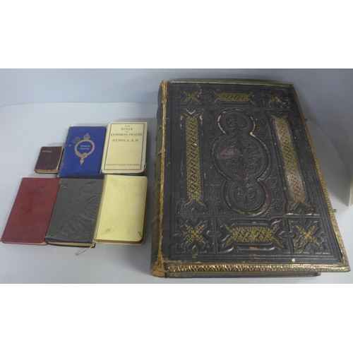 783 - A large family Bible and several miniature Bibles