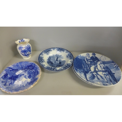 794 - Two blue and white chargers, two other plates and a vase