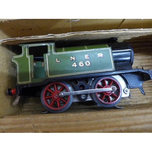 800 - A collection of Hornby O-gauge model rail including loco, wagons, carriages and track