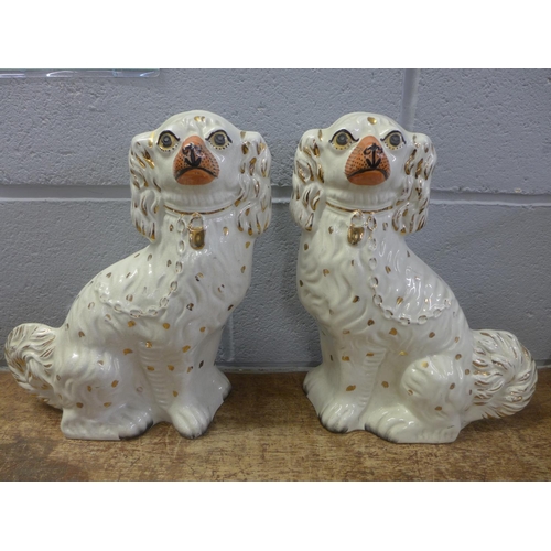 818 - A pair of Staffordshire spaniels