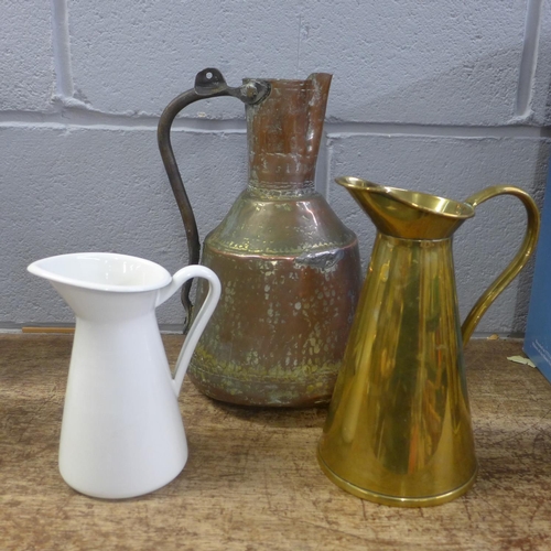 819 - Three jugs; brass, copper and enamel including one marked JS&S