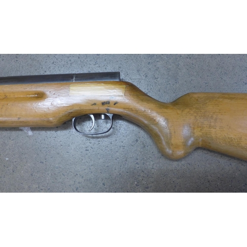 831 - A Weihrauch HW35 .22 target shooting air rifle, circa 1975, repairs to the stock, (13mm scope rails)... 