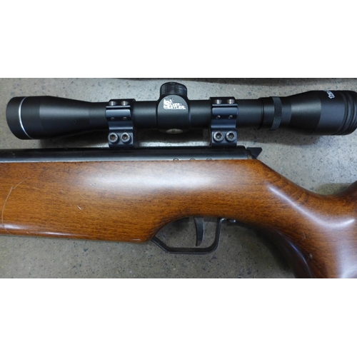 834 - A Spanish Cometa-300 .22 air rifle with silver Antler scope