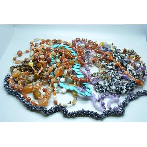 851 - A collection of gemstone necklaces, including amethyst, turquoise, agate, etc.