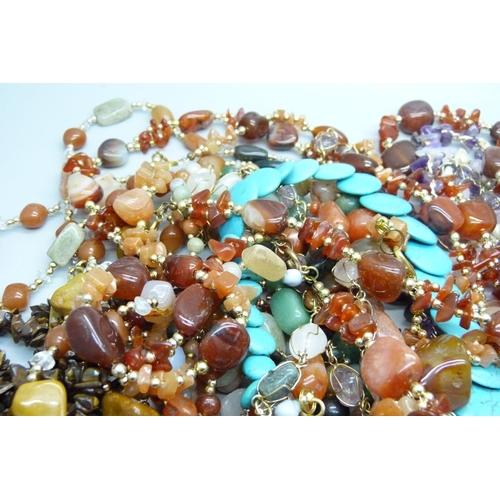 851 - A collection of gemstone necklaces, including amethyst, turquoise, agate, etc.