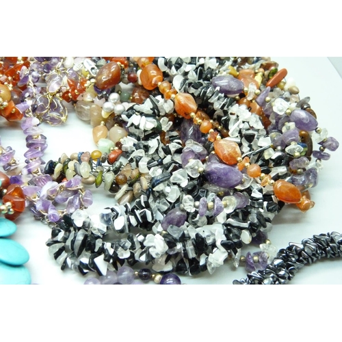 851 - A collection of gemstone necklaces, including amethyst, turquoise, agate, etc.