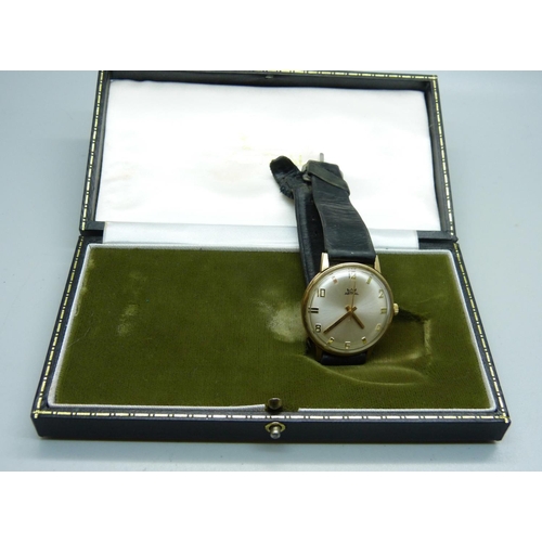 853 - A 9ct gold cased Astral wristwatch, the case back with inscription dated 1973