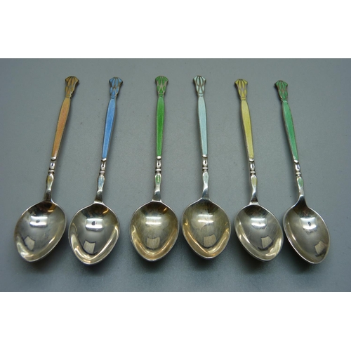 855 - A cased set of six Arts and Crafts silver and enamel spoons, 69g