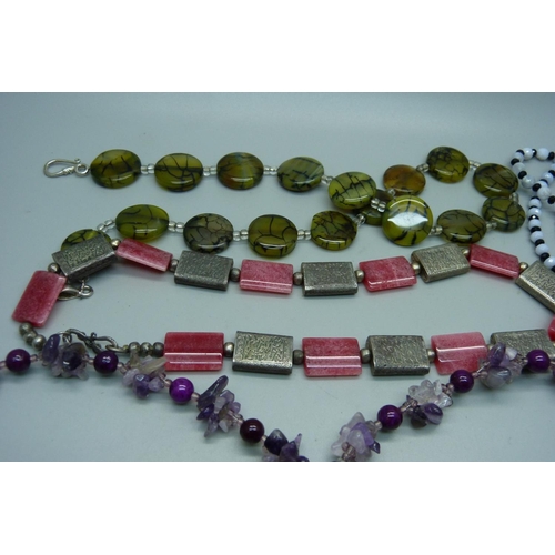 858 - Gemstone jewellery including necklaces, bracelets, earrings, etc.