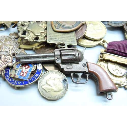 873 - A collection of fobs, medallions, etc.