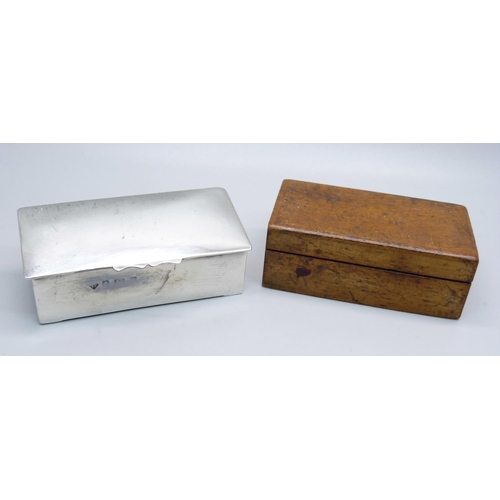 879 - A silver three section stamp box, Birmingham 1903, and a treen stamp box