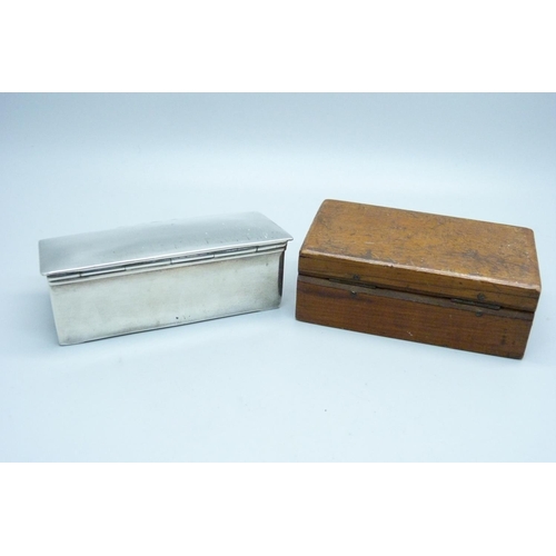 879 - A silver three section stamp box, Birmingham 1903, and a treen stamp box