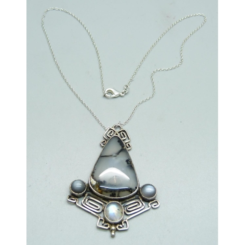 883 - A large silver, moonstone and moss agate pendant and chain