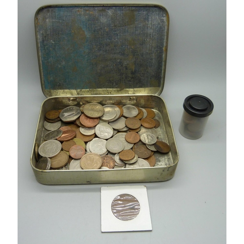 902 - A tin of mixed British and foreign coins