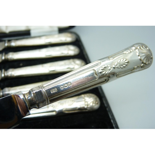 925 - A cased set of six silver handled knives