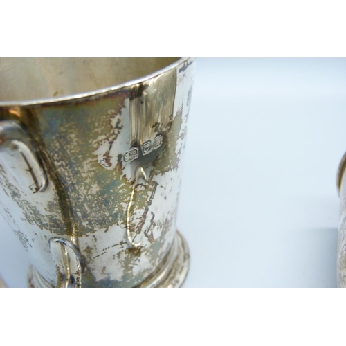 927 - A silver mug, with 'Peter' inscription and one other silver mug, handle a/f, 165g