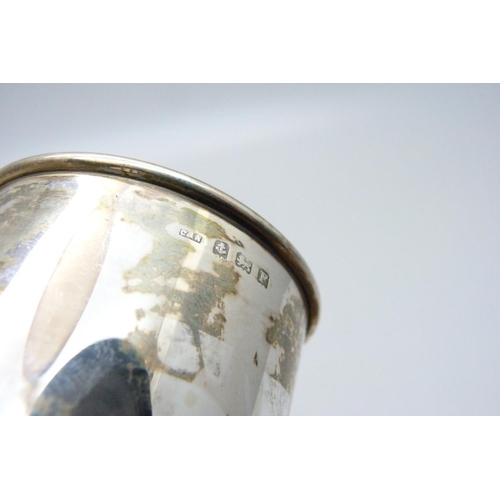 927 - A silver mug, with 'Peter' inscription and one other silver mug, handle a/f, 165g