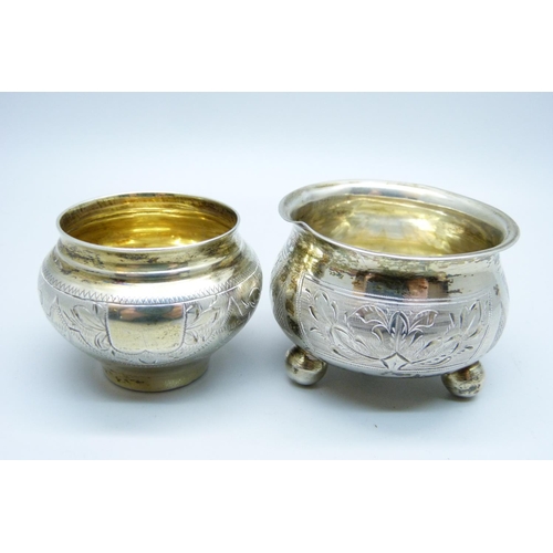 928 - A Russian silver salt and a Russian silver cup, 60g