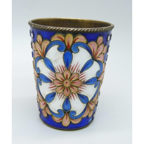 930 - A Russian silver and enamel vodka cup, 40g