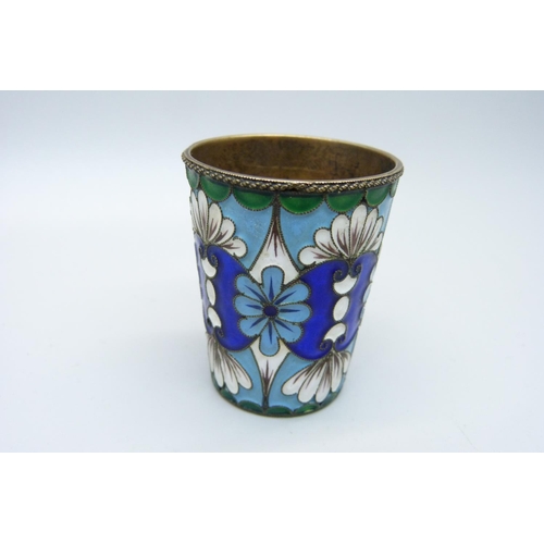 932 - A Russian silver and enamel vodka cup, 39g