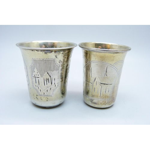 933 - Two Russian silver vodka cups, 24g and 18g