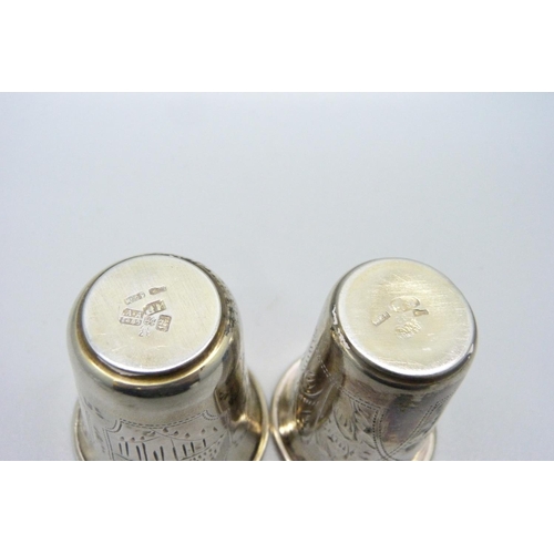 933 - Two Russian silver vodka cups, 24g and 18g