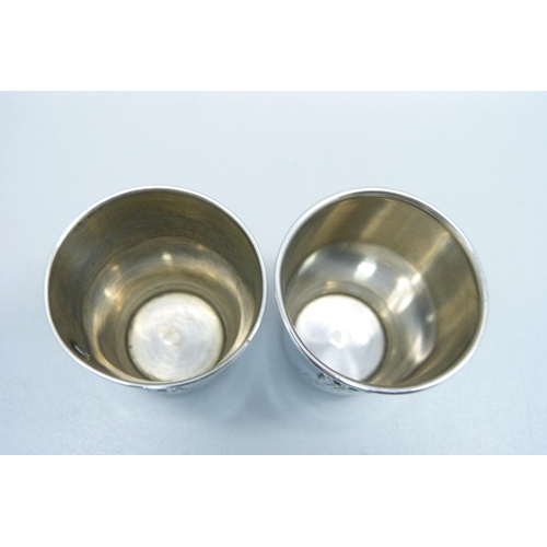 934 - A pair of continental silver vodka cups, 26g