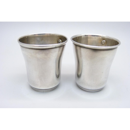 934 - A pair of continental silver vodka cups, 26g