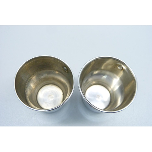 934 - A pair of continental silver vodka cups, 26g